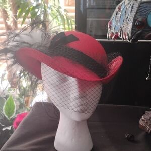 Elegant Red Feathered Hat
